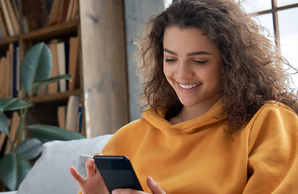 student talking with mental health care provide over the phone